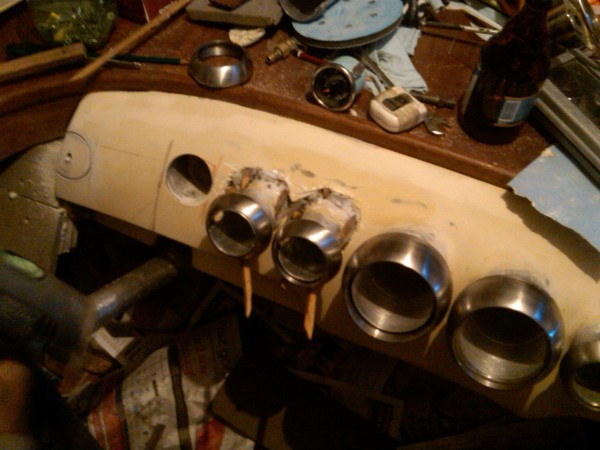 IMG00630-20110501-2201.jpg (613.24 KiB) Viewed 311530 times A hole next to right gauge shows, that the symetry was disturbed.